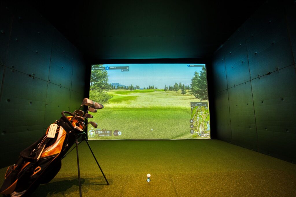 TrackMan golf simulator bay used for monthly golf simulator tournaments and simulator golf community events.